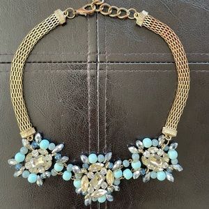 Elegant & Flashy— Light blue, white & grey gemstone necklace with gold hardware.